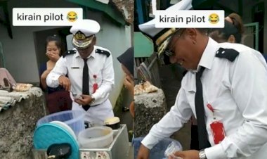 Penjual Cimol Ini Pakai Kostum Pilot