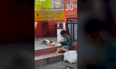 Bocah Pemulung Berbagi Makanan dengan Kucing Liar