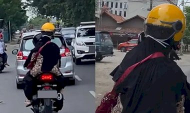 Terjadi Lagi Ibu-Ibu Pakai Helm Terbalik